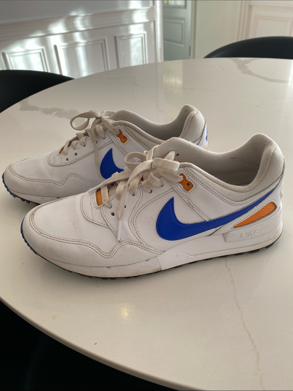 Nike Men’s golf White Athletic Sneakers with Blue Swoosh and Orange Accents